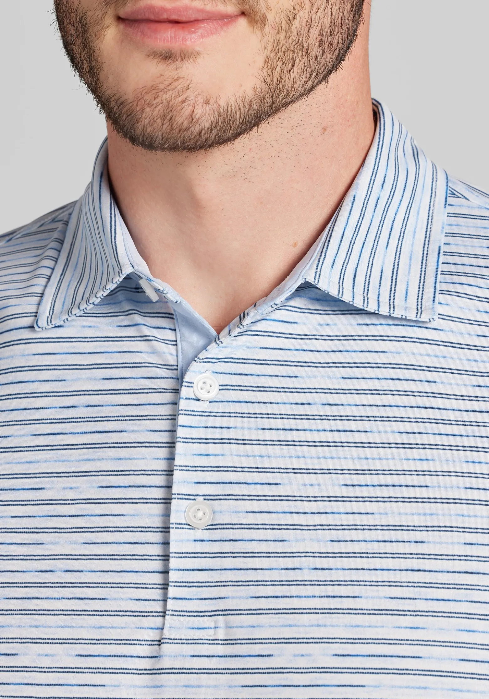 Traveler® Performance Tailored Fit Space Dyed Stripe Polo